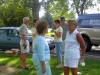 Nancy talks to Claudia, while Keith, Jody, Peg, and Gary visit in the backround.