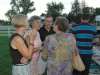 Sharon (Larson) Babl, Joyce (Bryan) & Dan Strout talking with Kathy (Enquist) Ronhovde
