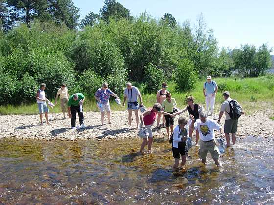 Crossing the river on the hike in the Colorado mountains