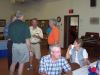 Brian Williams (back to camera) Terry Kreutzer, Kenton Thompson, and Charlie Cuypers visit at the Phelps Co. Museum.